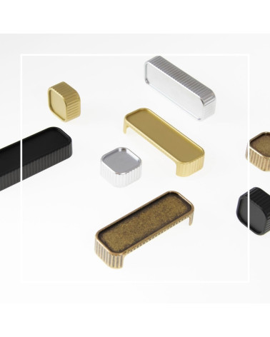 Maniglia per mobile WEGA maniglia design disposta su una superficie bianca