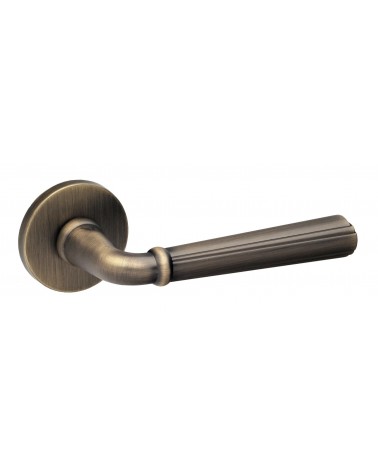 Maniglia per porta retrò CASCADA su placca rotonda - maniglia design