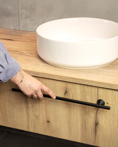 Maniglia per mobile ROG maniglia design fissata su un mobile in legno