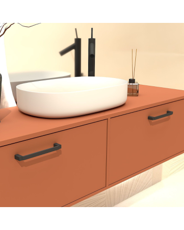 Maniglia per mobile nera opaca AMARO maniglia design montata su un mobile da bagno