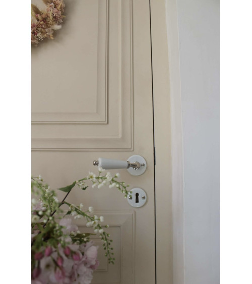 Maniglia per porta a cannone su rosetta bianca in porcellana - colore nichelato - maniglia design