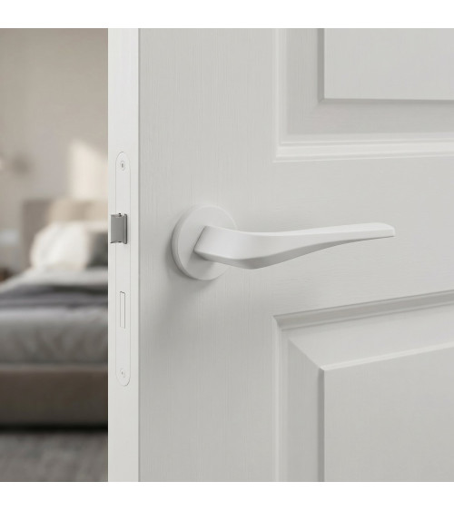 Maniglia per porta bianca opaca FLOW su placca rotonda - maniglia di design