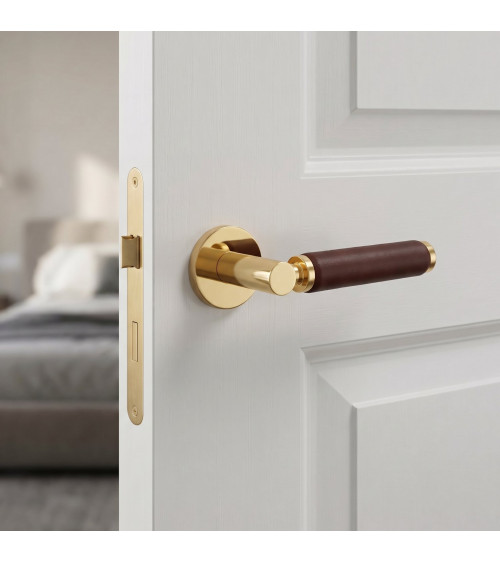 Maniglia per porta in oro lucido e pelle scura TUPAI 4200/201 rotonda - maniglia design