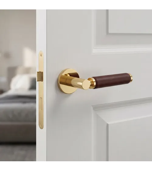 Maniglia per porta in oro lucido e pelle scura TUPAI 4200/201 rotonda - maniglia design