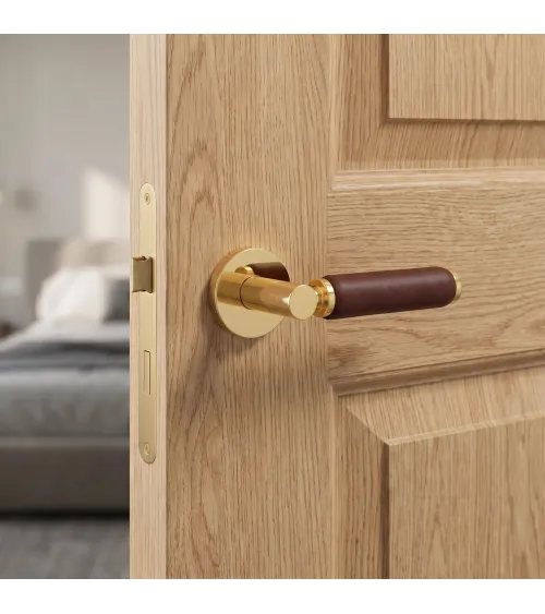 Maniglia per porta in oro lucido e pelle scura TUPAI 4200/201 rotonda - maniglia design