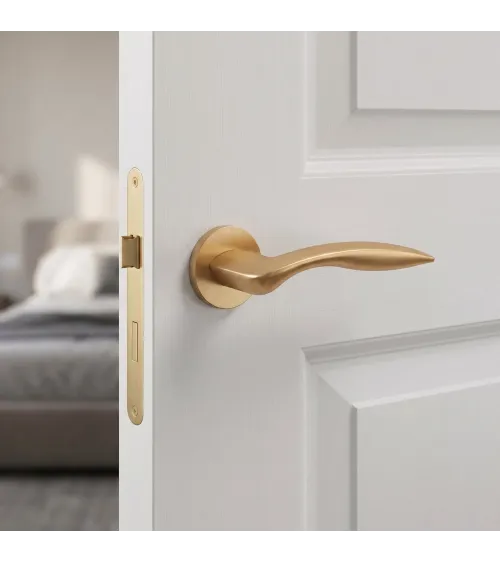 Maniglia per porta su placca rotonda ROBINE ferramenta design
