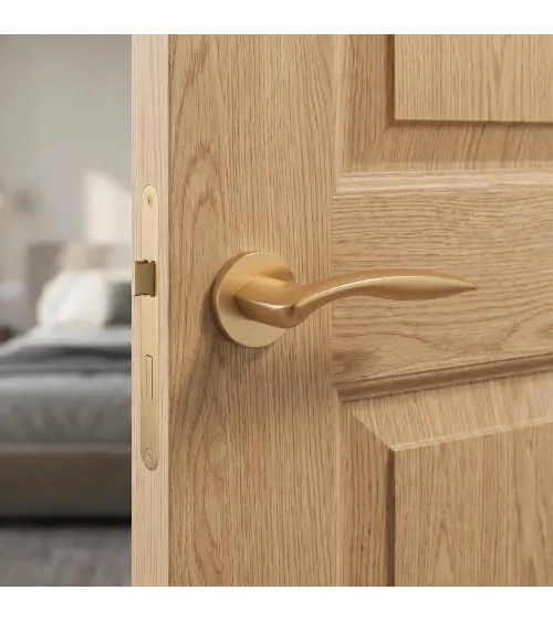 Maniglia per porta su placca rotonda ROBINE ferramenta design