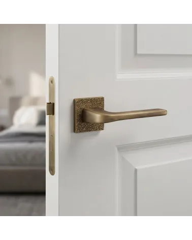 Paio di maniglie per porta TUPAI 4007-T3 finitura patina anticata opaca - Millamaniglie