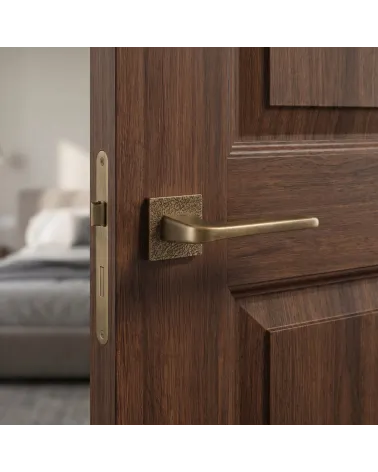 Paio di maniglie per porta TUPAI 4007-T3 finitura patina anticata opaca - Millamaniglie