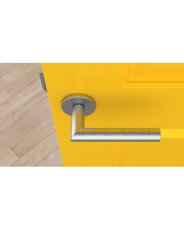 Maniglia per porta colore cromo satinato ARABIS maniglia design vista dall'alto montata su una porta