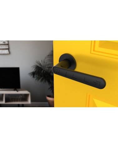 Maniglia per porta nera opaca ARIA maniglia design vista in prospettiva montata su una porta