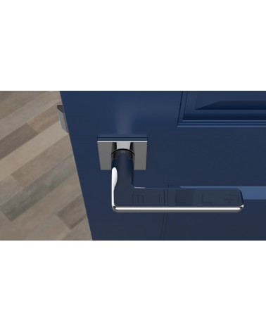 Maniglia per porta Contemporanea SETIA ferramenta design vista dall'alto montata su una porta