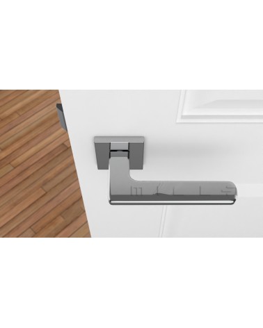 Maniglia per porta cromata lucida YUKA ferramenta design vista dall'alto montata su una porta