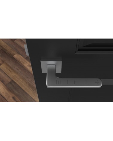 Maniglia per porta cromo satinato YUKA ferramenta design vista dall'alto montata su una porta