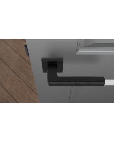 Maniglia per porta SALICE nera ferramenta design vista dall'alto montata su una porta