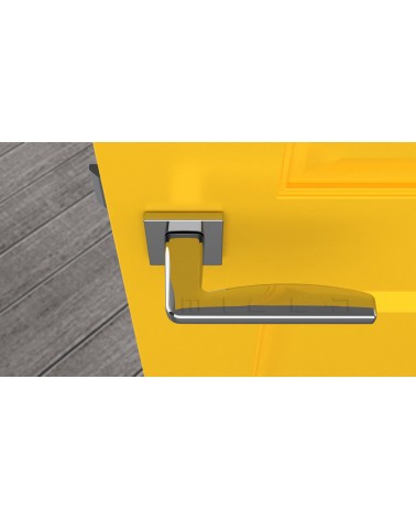 Maniglia per porta ERBA design cromo lucido vista dall'alto montata su una porta