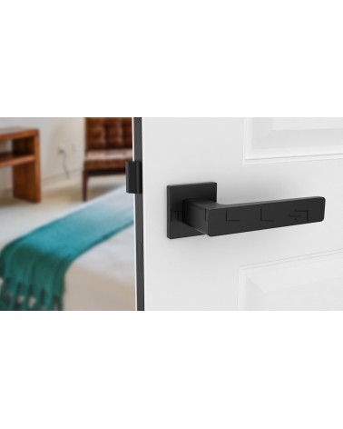 Maniglia per porta nera ERICA design vista frontale montata su una porta