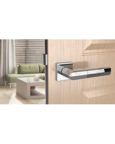 Maniglia per porta cromo lucido FRESIA maniglia design vista frontale montata su una porta