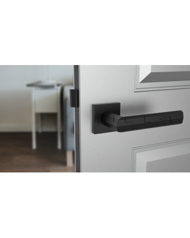 Maniglia per porta moderna FRESIA maniglia design vista frontale montata su una porta
