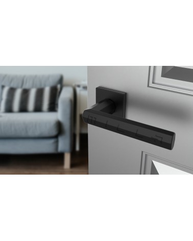 Maniglia per porta moderna FRESIA maniglia design vista dall'alto inclinata montata su una porta