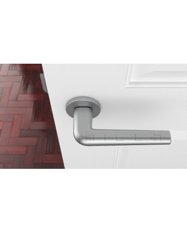 Maniglia per porta cromata satinata FUNKIA maniglia design vista dall'alto montata su una porta