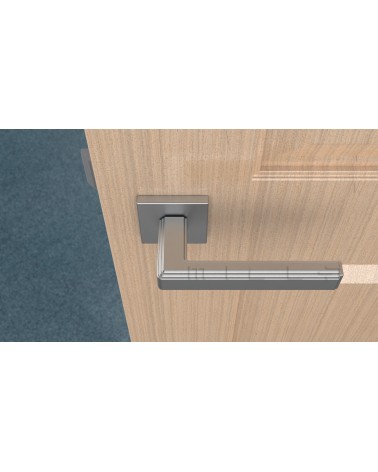 Maniglia per porta cromata satinata RAFLESIA maniglia design vista dall'alto montata su una porta