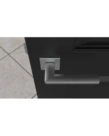 Maniglia per porta cromo satinato PYROLA ferramenta design vista dall'alto montata su una porta