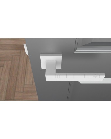 Maniglia per porta bianca PINA maniglia design vista dall'alto montata su una porta