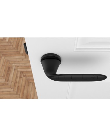 Maniglia per porta futuristica PEONIA maniglia design vista dall'alto montata su una porta