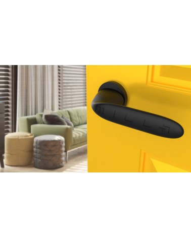 Maniglia per porta futuristica PEONIA maniglia design vista dall'alto inclinata montata su una porta