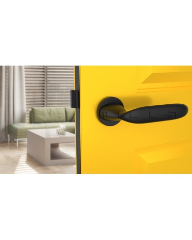 Maniglia per porta futuristica PEONIA maniglia design vista frontale montata su una porta