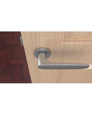 Maniglia per porta cromo satinato ROSA maniglia design vista dall'alto montata su una porta