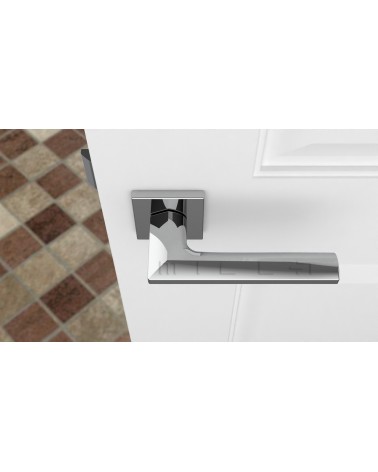 Maniglia per porta cromata lucida JASMINA maniglia design vista dall'alto montata su una porta