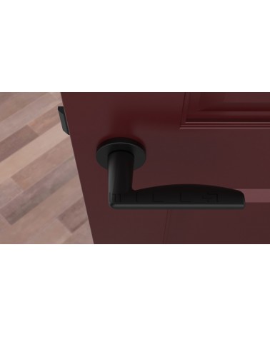 Maniglia per porta nera LUNA design vista dall'alto montata su una porta