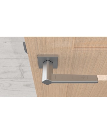 Maniglia per porta colore cromo satinato NINFEA maniglia design vista dall'alto montata su una porta