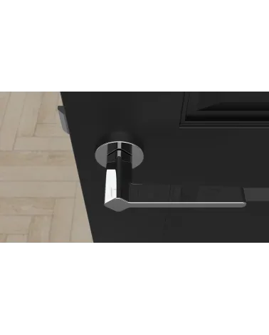 Maniglia porta stile futuristico NINFEA ferramenta design vista dall'alto montata su una porta