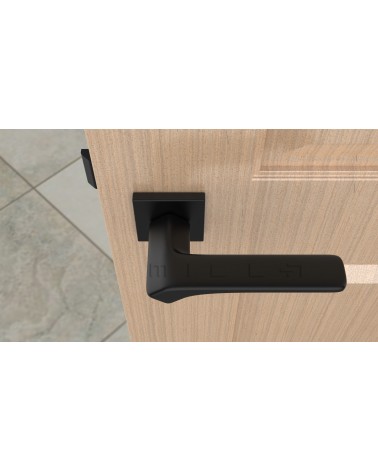 Maniglia per porta nera BERGERIA ferramenta design vista dall'alto montata su una porta