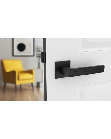 Maniglia per porta perla nera TILLIA porta interna design vista frontale montata su una porta