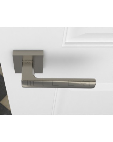 Maniglia per porta moderna DIUNA maniglia design vista dall'alto montata su una porta