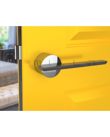 Maniglia per porta bicolore JUMELLE maniglia design vista frontale montata su una porta