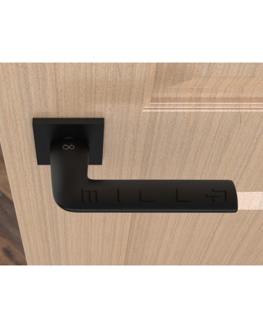 Maniglia per porta nera STINGER maniglia di design vista dall'alto montata su una porta