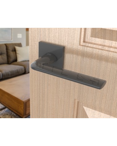 Maniglia per porta titanio STINGER maniglia design vista inclinata montata su una porta
