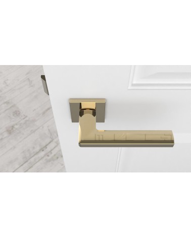 Maniglia per porta su placca quadrata PYROLA ferramenta design vista dall'alto montata su una porta