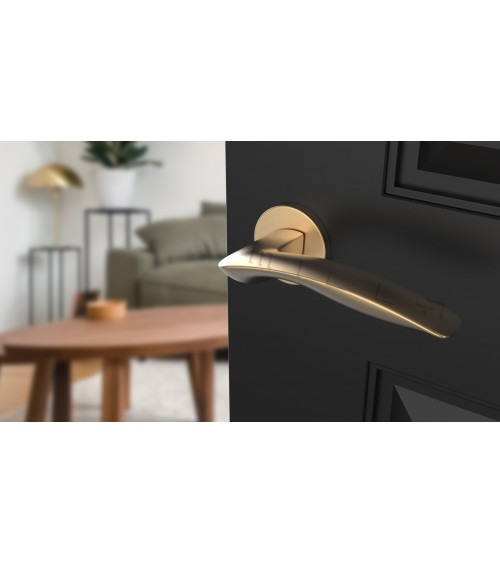 Maniglia per porta su placca rotonda ROBINE ferramenta design