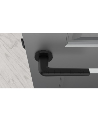 Maniglia per porta in zamak FUNKIA maniglia design vista dall'alto montata su una porta