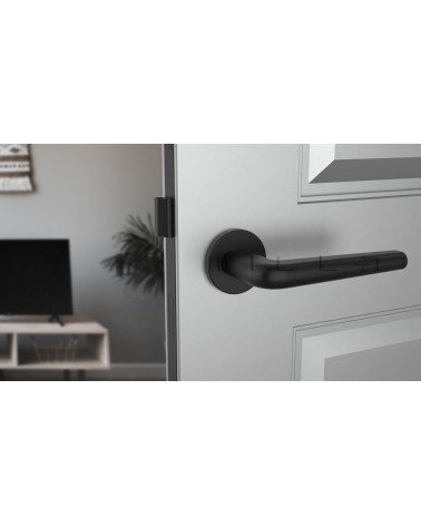 Maniglia per porta in zamak FUNKIA maniglia design vista frontale montata su una porta