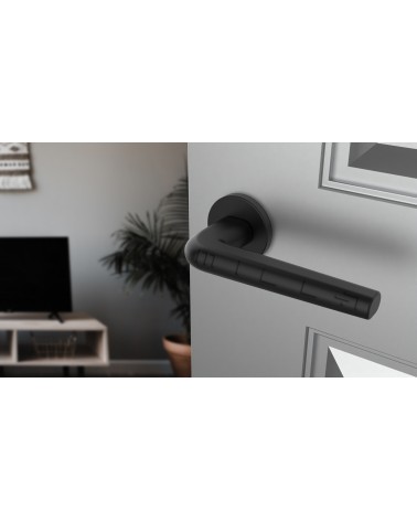 Maniglia per porta in zamak FUNKIA maniglia design vista dall'alto inclinata montata su una porta