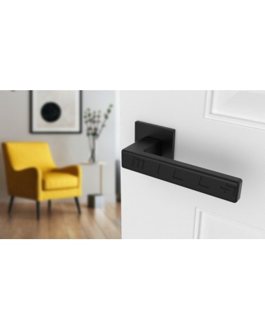 Maniglia per porta in zama TILLIA maniglia design colore 1 vista dall'alto inclinata montata su una porta