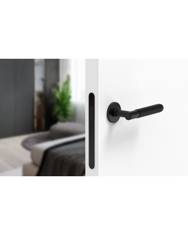 Maniglia per porta nera Time Slim design montata su una porta