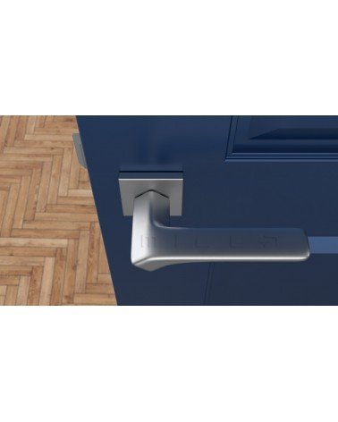 Maniglia per porta in cromo satinato BERGERIA ferramenta design vista dall'alto montata su una porta